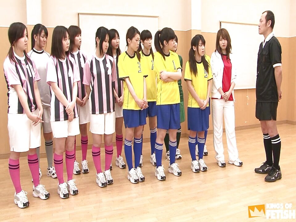 Japanese female team listen and take a lesson from their coach